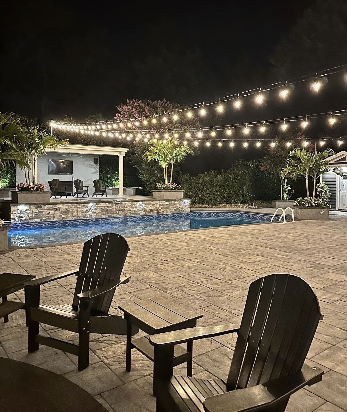 Outdoor pool and landscape lighting installed for a New Jersey homeowner
